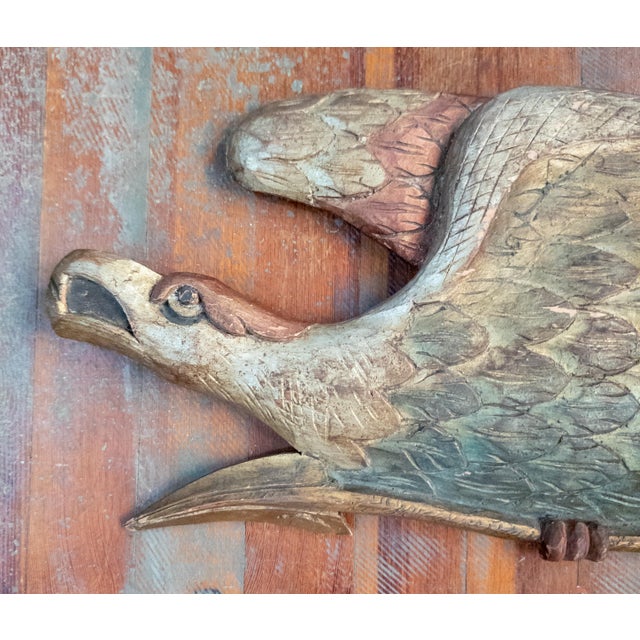 We are selling this cool mid 20th century carved wood patriotic eagle. This wood eagle is carved after the style of John...