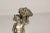Bronze Mid 20th Century Baroque Style Silvered Bronze Statuette of a Putto Carrying a Fruit Basket For Sale - Image 8 of 12