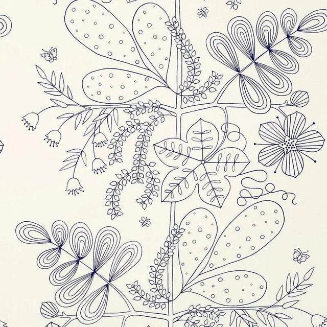 A stylized botanical pattern, Blommen's tendrils, bluebells, and palm-style fronds recall midcentury Scandinavian designs....