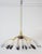 Linear elegance, brass and black painted six arms chandelier, holding round opaline glass shades. Excellent vintage...