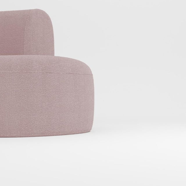 Hug sofa is defined by clean, simple lines and a distinctive armrest detail. The armrest, half overlapping the seat...