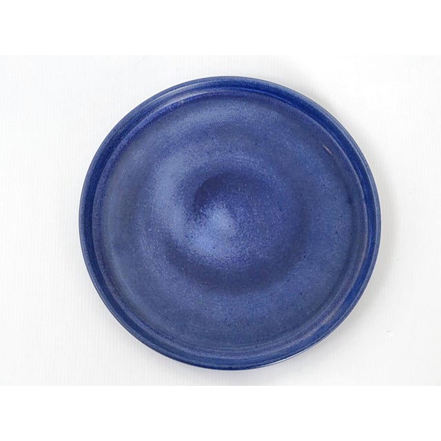 Very good overall condition, with a minor original firing flaw. Diameter 34 cm. Height 3.5 cm. A magnificent tray by...