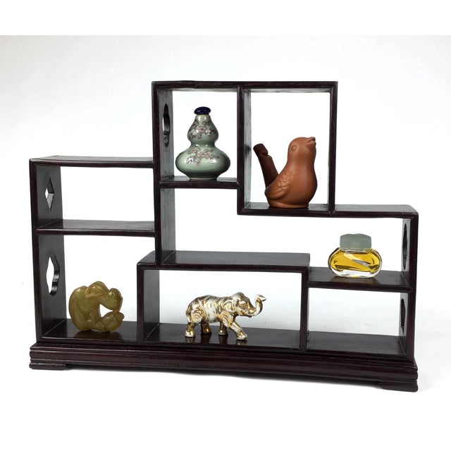 This tiny little shelf unit is made from rosewood and has never been used. It’s been lovingly stored for years in its...