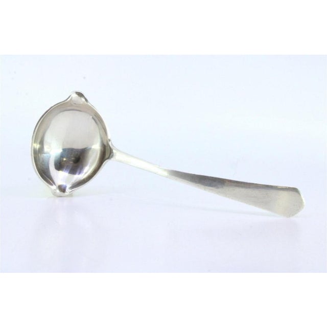 Silver Sauce Spoon with Handle, in Very Good conditions. Designed 1920 to 1949 This piece has an attribution mark, I am...