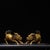 This is a matched pair of finely cast antique gilt bronze sculptures depicting Qilin, mythical hooved creatures revered in...