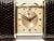A lovely working Movado Ermeto traveling alarm clock. Covered in a lizard or faux lizard skin. The clock watch winds as...