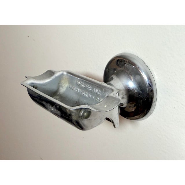 Up for sale is a rare vintage industrial ashtray made by Hoegger Inc. in Weehawken, New Jersey. This wall-mounted chrome...