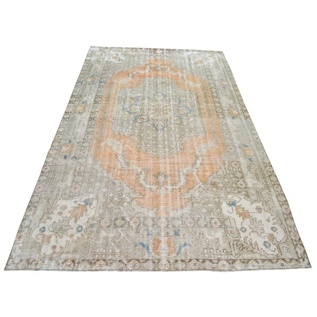 Hand-knotted with care using traditional rug making techniques, this wool rug blends timeless craftsmanship with a modern...