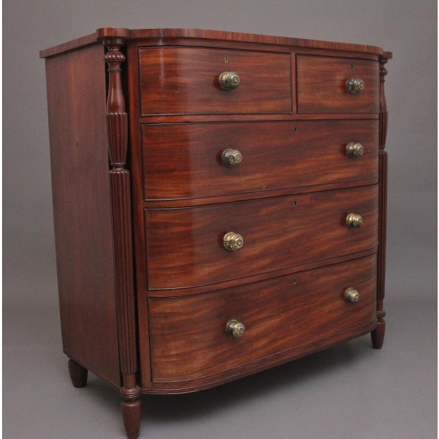 A large and impressive 19th Century mahogany bowfront chest of drawers, having a nice shaped figured top above a selection...
