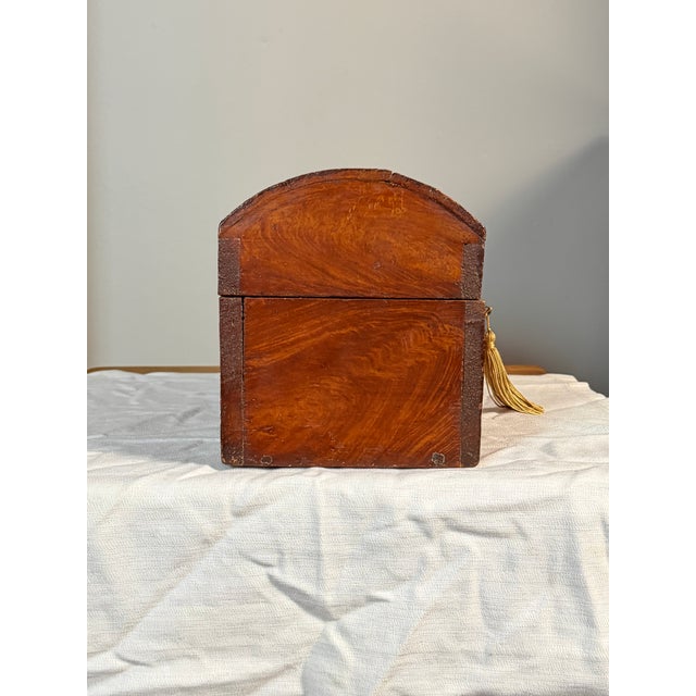 A nice small early American faux grain-painted document box dating to the early 19th century, retaining most of its...