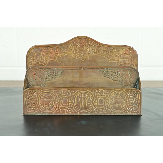 A gorgeous antique Arts & Crafts or Art Deco period bronze "Zodiac" pattern desk letter holder rack By Tiffany Studios...