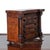 A Scottish miniature chest of drawers in burled wood. Drawer inscribed on underside with maker's name: "E.B. McGowan; Bank...