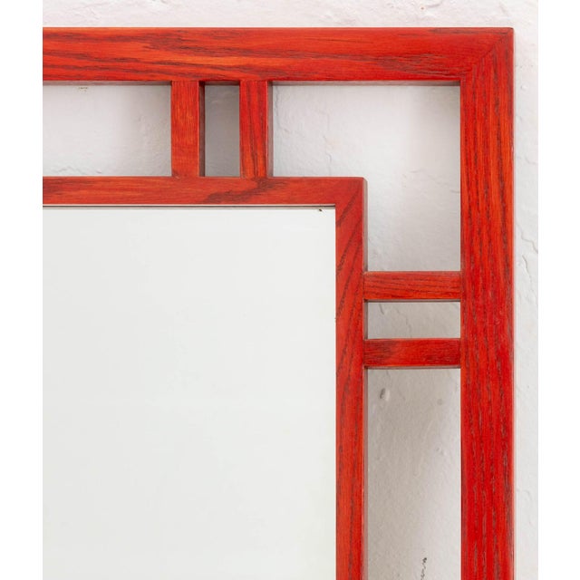 James Mont Style Red Stained Oak Framed Mirror, the reticulated frame with geometric design. Mirror plate: 36.75" H x...
