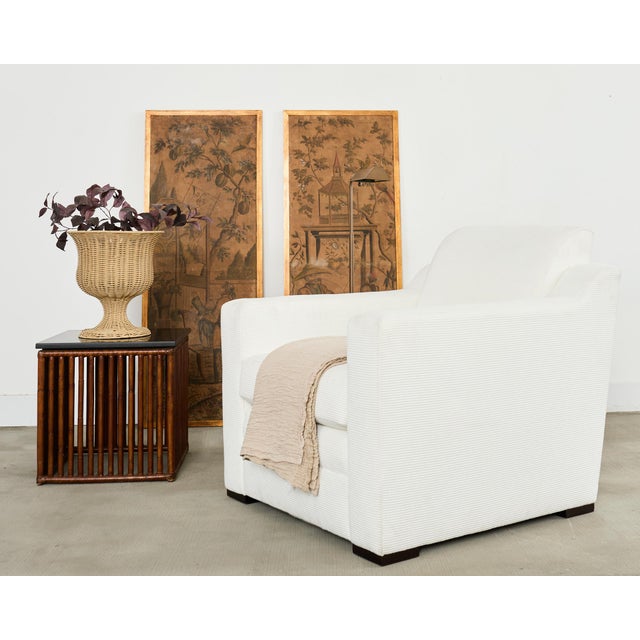 Distinctive Italian club chair or lounge chair designed by Ralph Lauren. The "Raymond" club chair features a large, deep...