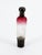 An elegant, slender, cylindrical "travel" perfume bottle, made by the prestigious Daum Manufacture in Nancy around...