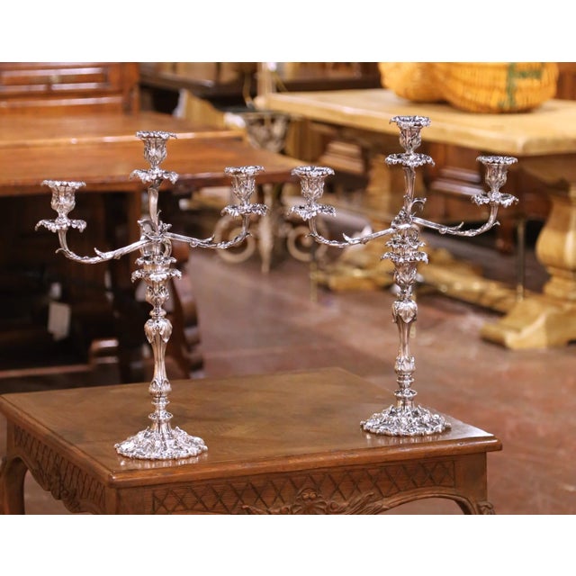 Decorate a dining table or mantel with this elegant pair of antique silver-plated candelabras, crafted in France circa...