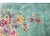 A bold and beautiful early 20th century Chinese Art Deco rug with a mint green field with large auspicious floral clusters...
