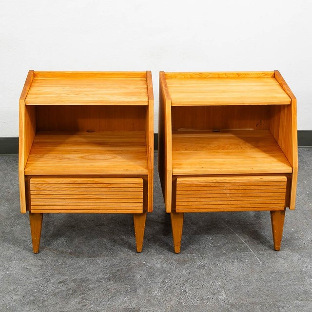 Pair of solid oak nightstands by Dillingham. Recently restored and ready for another 30 years of use. Marked and dated...