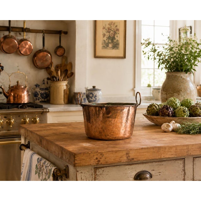 A lovely antique 19th Century French hand hammered copper pot. This charming pot is large and full of character,...