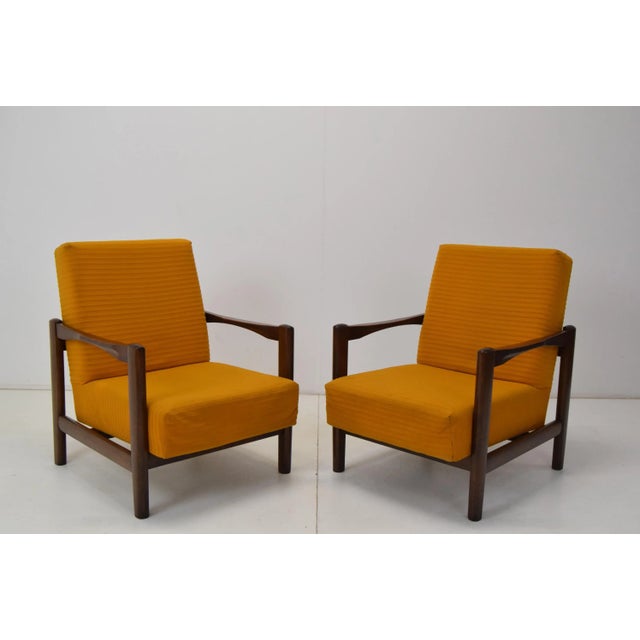 Made in Czechoslovakia. Made of wood, fabric. Upholstery bears signs of use. Original condition.