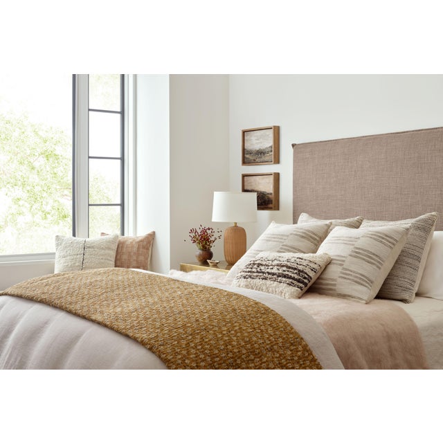 Throw pillows by Amber Lewis x Loloi take inspiration from heirloom textiles and earth-toned palettes to create an...