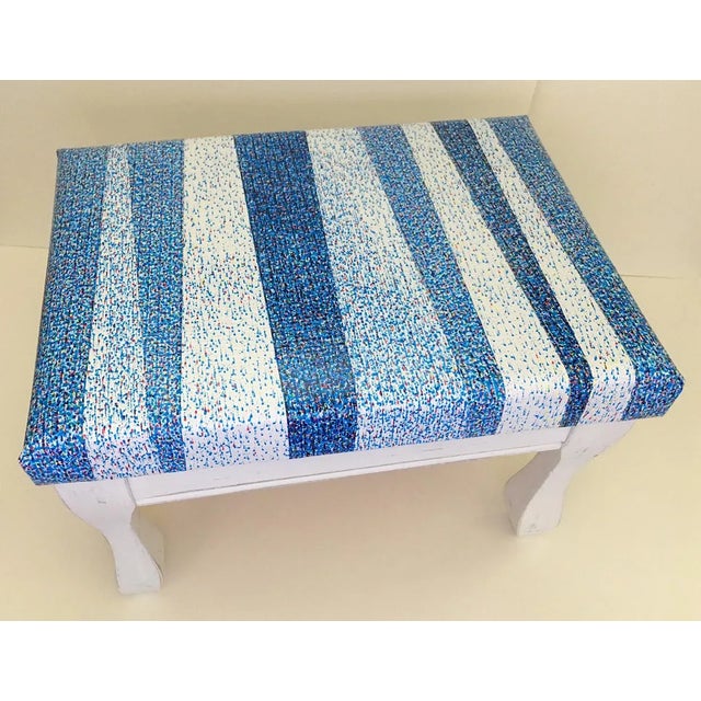 Made from pixelated recycled billboard vinyl for a one-of-a-kind stool. Heavy weight recycled billboard vinyl strips has...