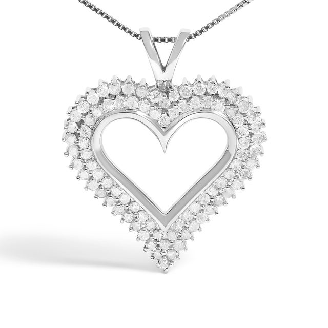 Celebrate someone you love with this stunning diamond heart pendant. This diamond necklace features 2 rows of round...