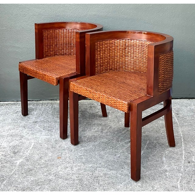 Exemplifying the timeless sophistication of the Ralph Lauren Home collection, this pair of barrel-back dining chairs...