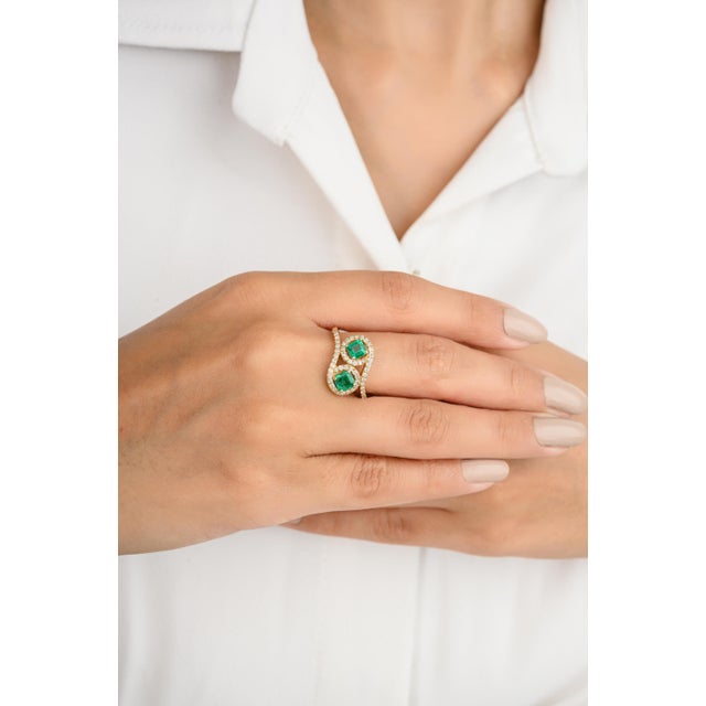 Two Stone Emerald Halo Wedding Ring Gift for Her in 18K Gold featuring natural emerald of 0.96 carats and diamonds of 0.37...