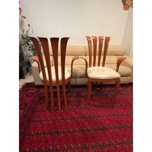 Set of 8 A Sibau Post Modern Italian Dining Chairs A vintage set of sculptural chairs from A Sibau. These chairs represent...