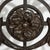 A neoclassical console table featuring a wrought iron base with scrolling detail. The top is formed from solid Belgian...