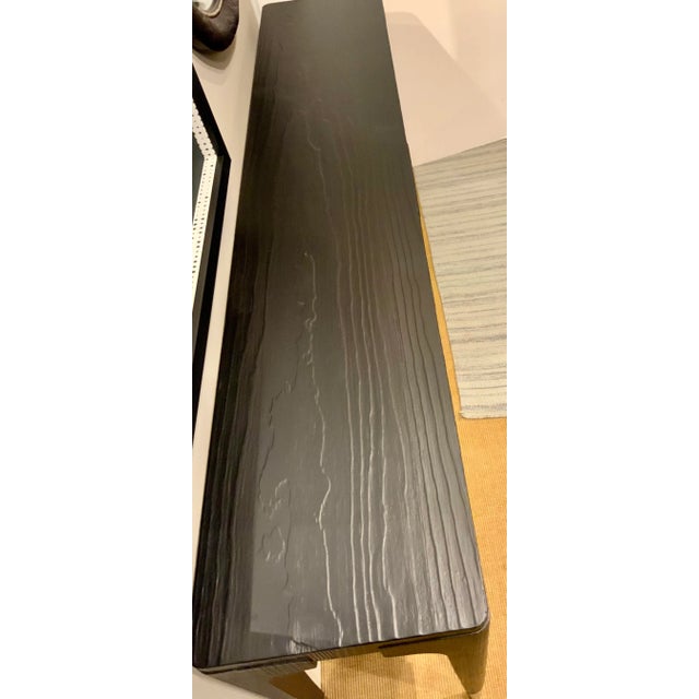Stylish Organic Modern Rustic Charred Black Finished Console Table, textured silver finished metal ferrules, showroom...