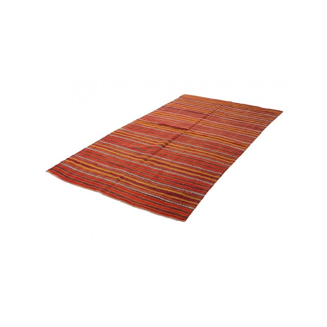Handwoven vintage striped decorative kilim rug from Denizli region of Turkey. Approximately 50-60 years old. In very good...