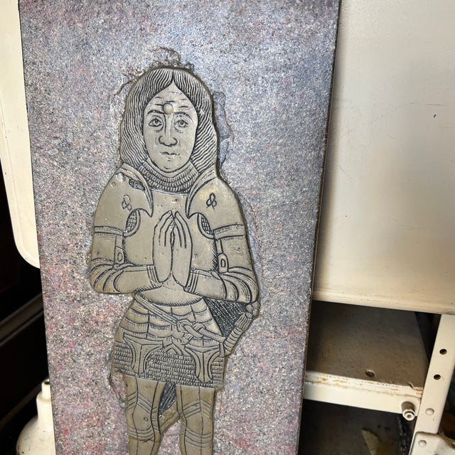 Vintage reproduction metal plaques used as templates for brass rubbing. It feature replicas of historic monumental brass...