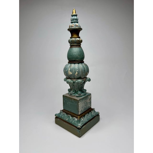 The French Napolean style of this decorative finial is finished with a French blue color tone and is distressed throughout...