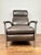 Radius Leather Recliner by Ethan Allen. The contemporary silhouette has a nickel-plated steel frame enhanced with...