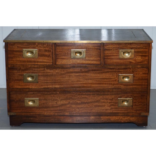 This is a lovely Bevan Funnell Reprodux Military campaign desk of drawers with brass fittings and leather top designed to...