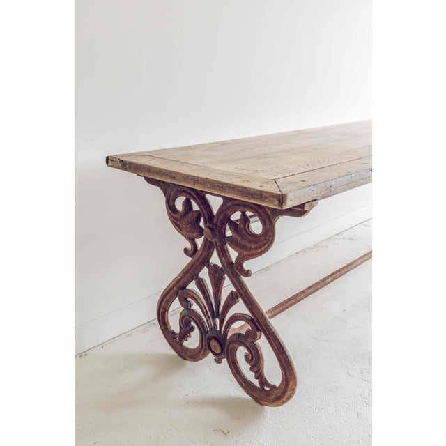 19th c. French oak dining table or console table with iron base. This table was found in Southern France in the...