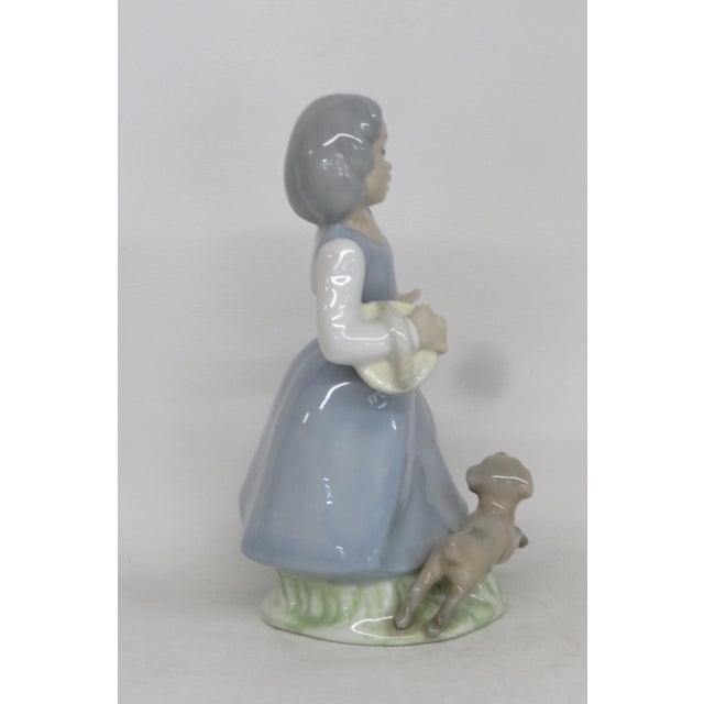 This charming Figurine is made of porcelain. This adorable piece is stamped as being made in Spain by Tenora, see...