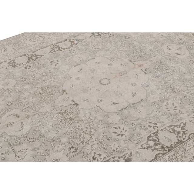 Hand-knotted in wool circa 1970-1970, this 8x11 vintage Siraz rug is a rare new curation believed to originate from the...