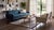 Elevate your living space with this striking modern Navajo-style wool area rug, crafted with exceptional technique and an...