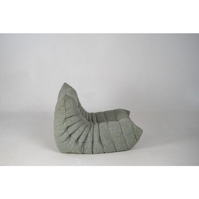 This Togo has been reupholstered with new foam and high-quality new fabric, keeping its inner structure, giving the item...
