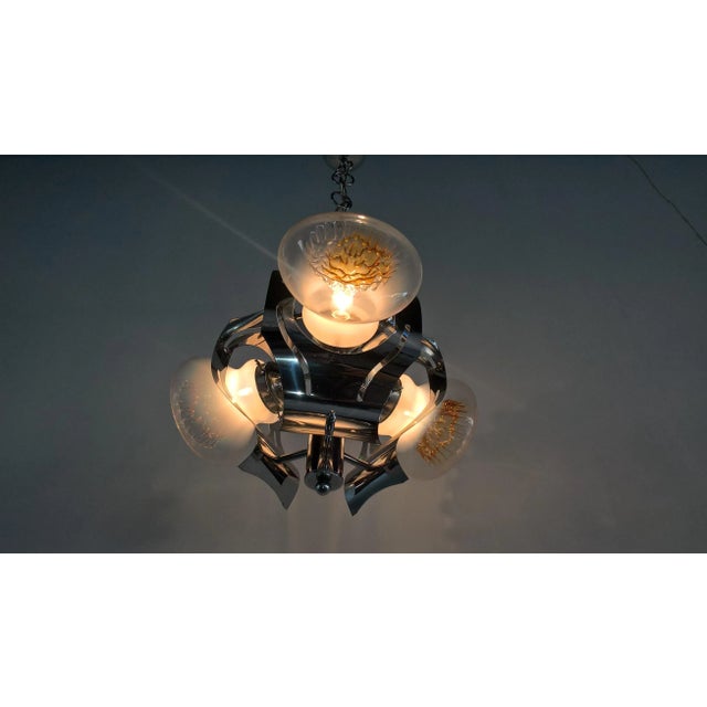 Vintage Chrome Ceiling Lamp from Mazzega, in Very Good conditions. Designed 1970 to 1979 This piece is attributed to the...