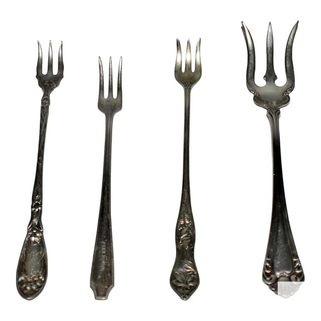 Antique Set of Four Decorative Silverplate Forks For Sale