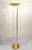 This elegant and classy floor lamp is made of brass and clear Lucite. The uplighter shade, foot and side of the pole are...