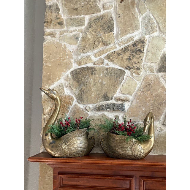✨Vintage brass elegance meets festive charm✨ These stunning brass swan planters bring a warm holiday glow to any space....