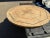 Travertine round table top. Top has an inlaid design in middle. Multi colored. The top is is in excellent condition, no...