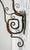 Very large exterior iron sconce with beautiful brass detailing and amber glass in excellent condition. The aged patina has...