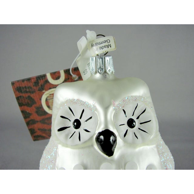 Well cared for with little-to-no obvious damage Glitter does come off—as glitter does Original Neiman Marcus tag adhered