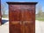 Beautiful, medium-sized Louis Philippe period wardrobe in solid walnut. Two large, paneled walnut doors with original...